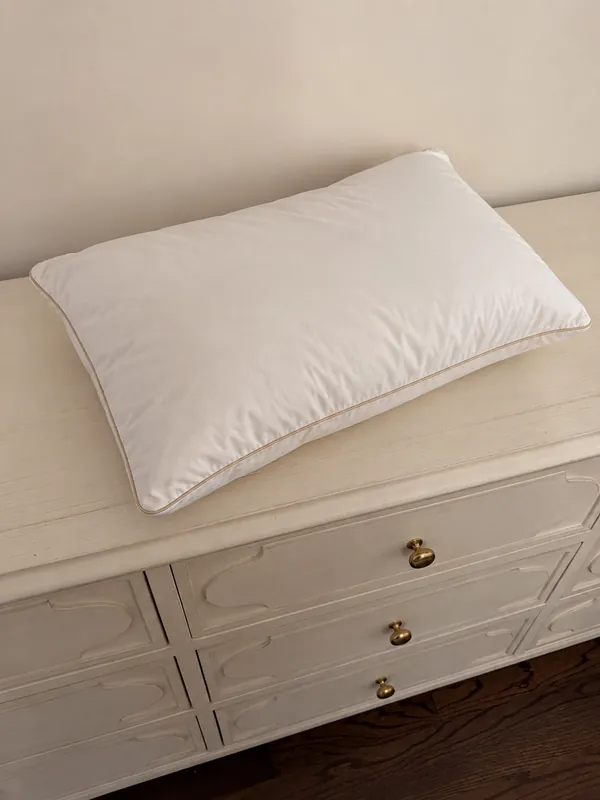 Review photo: the pillow on a cream dresser